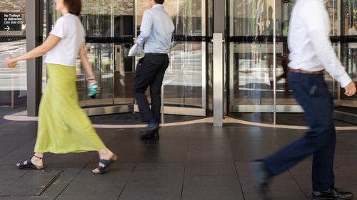 Generic street scenes in Sydney CBD. EY, Ernst & Young, accounting firm, office workers, employment, revolving door. 