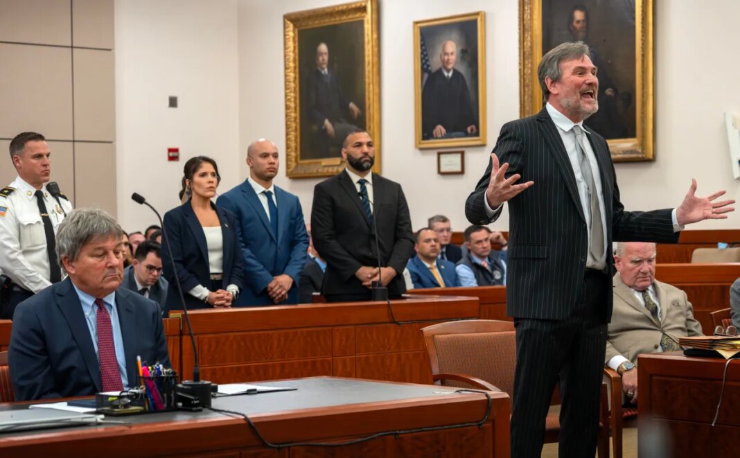 Lawyer Bradford Bailey, right, speaks as Lt. Jennifer Penton, center, from left, and troopers David Montanez and Edwin Rodriguez, are arraigned on charges of involuntary manslaughter in the death of Enrique Delgado-Garcia, in Worcester Superior Court, Thursday, April 2, 2026, in Worcester, Mass. Special prosecutor David Meier is seated at left. (Rick Cinclair/Worcester Telegram & Gazette via AP, Pool)