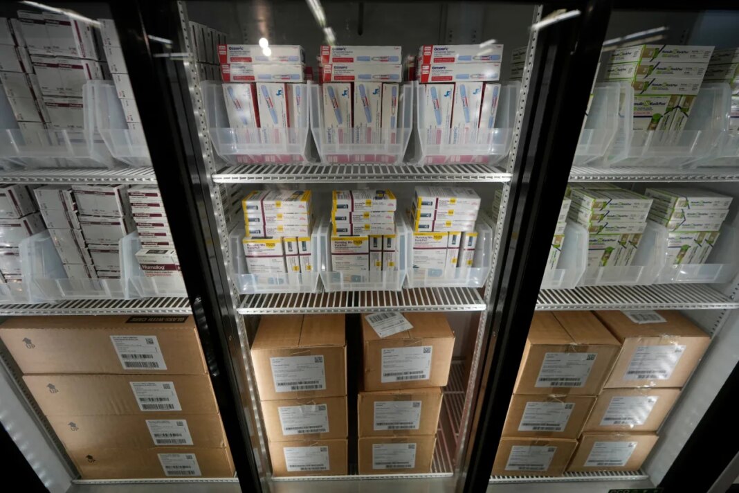 FILE - Packets of insulin vials and pens are warehoused at a Kaiser warehouse in Downey, Calif., March 18, 2023. (AP Photo/Damian Dovarganes, file)