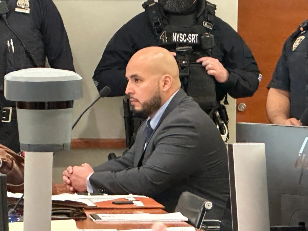 Former New York City police sergeant Erik Duran is seated during his sentencing hearing at the Bronx County Hall of Justice Thursday, April 9, 2026, New York, for tossing a picnic cooler full of drinks at a fleeing suspect, Eric Duprey, who then crashed his motorized scooter and died. (AP Photo/Michael R. Sisak)