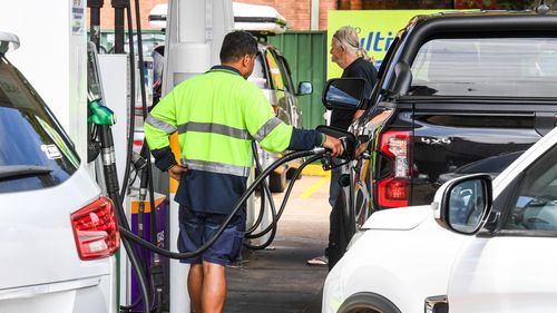 Long queues for petrol at a Sydney service station.