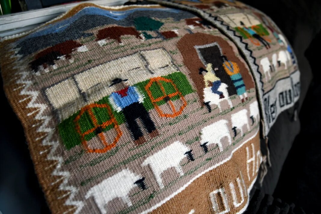 Weavings created by Ella Mae Begay, who went missing from her home, are displayed in her son