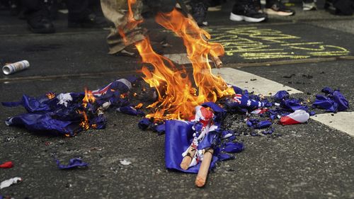 Robbie Katter argues the Australian flag is more than a physical object, and that flag burning could incite anger or further unrest.