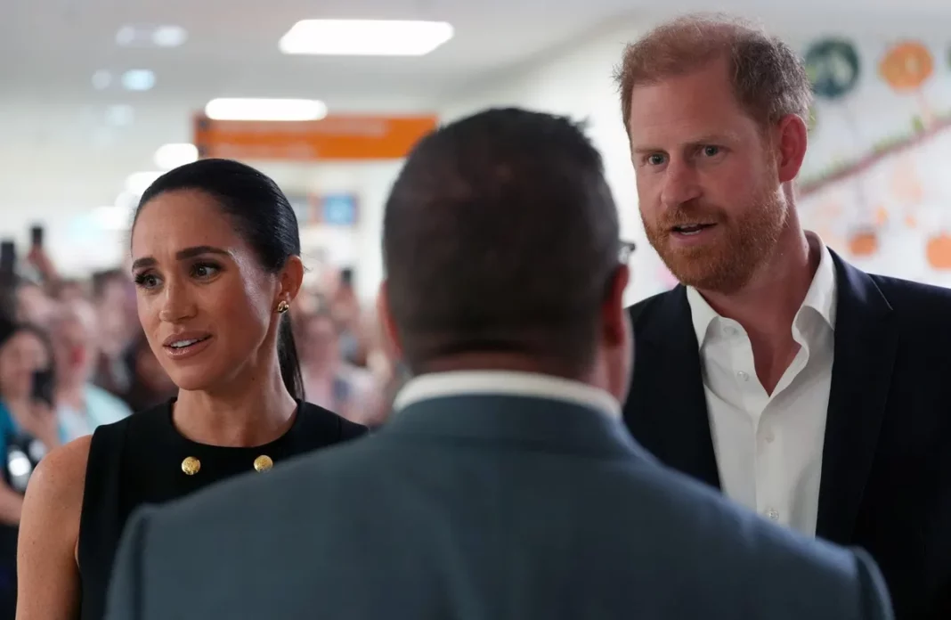 Meghan Markle 'Not Happy' With Reporter Questioning Prince Harry During Australia Trip