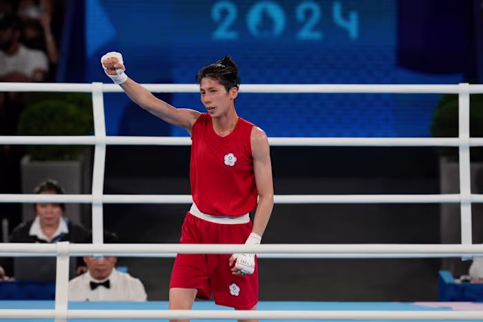 Olympic gold medalist boxer at center of gender controversy advances to Asian semifinals