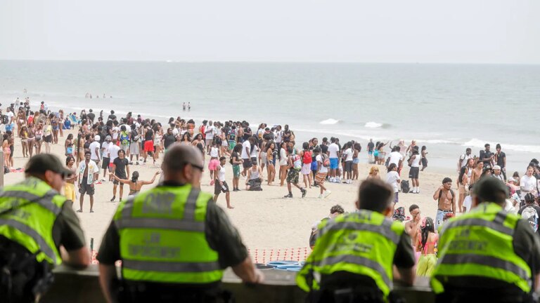 Massive Beach Party Leads to 26 Arrests and Discovery of Homemade Machine Gun