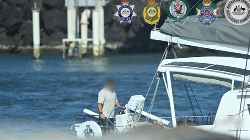 Police have charged a man after 200 kilograms of cocaine was unearthed aboard a catamaran sailing on the Tweed River, near the Queensland﻿-NSW border.