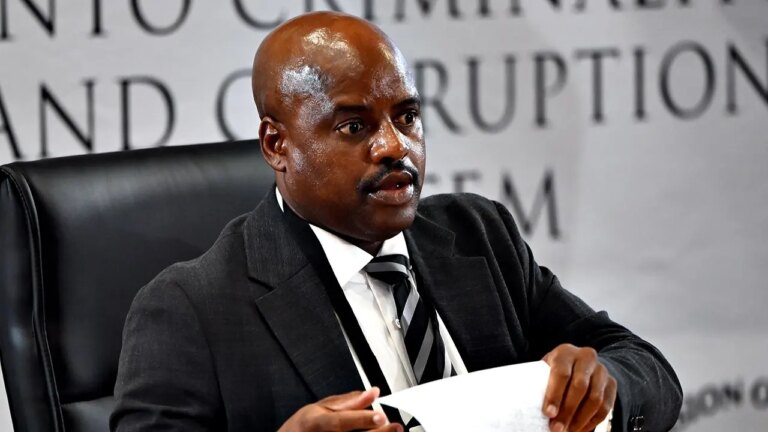 Ex-South African Police Chief’s Blunder at Corruption Inquiry: Tissue Stuck on Forehead Goes Viral