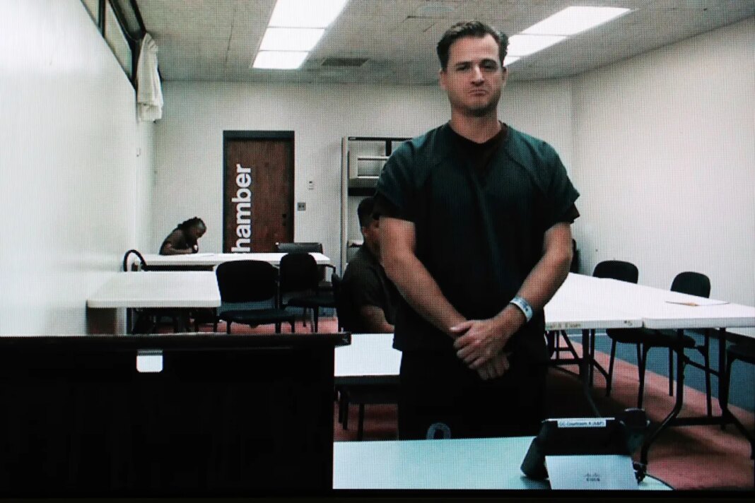 FILE - Hawaii doctor Gerhardt Konig appears before a judge via video during an arraignment hearing after being indicted on allegation of attempting to kill his wife, April 7, 2025, in Honolulu. (AP Photo/Marco Garcia, File)