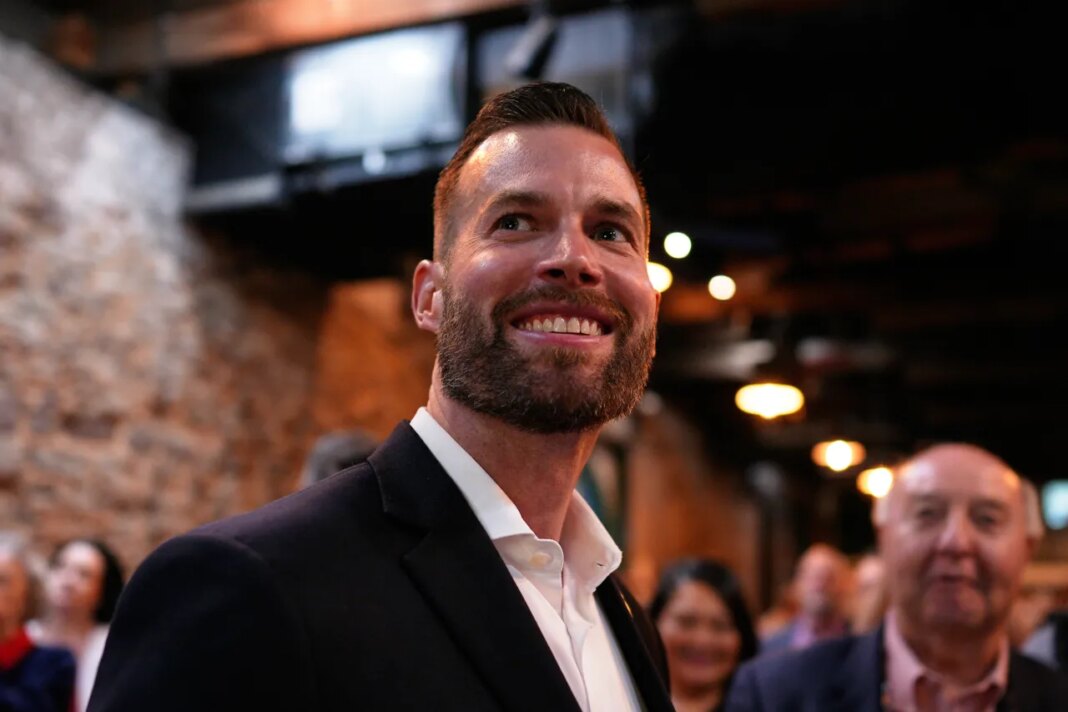 Republican candidate Clay Fuller smiles as election results roll in during an election night watch party, Tuesday, April 7, 2026, in Ringgold, Ga. (AP Photo/Mike Stewart)