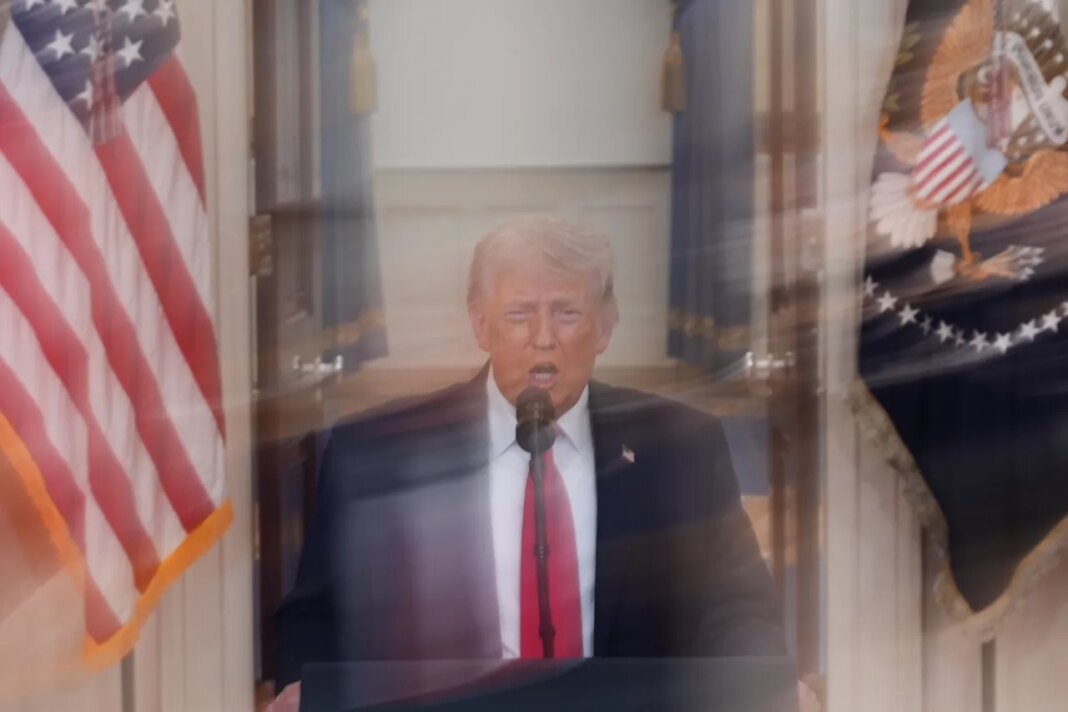 In this image made with a long exposure, President Donald Trump speaks about the Iran war from the Cross Hall of the White House on Wednesday, April 1, 2026, in Washington. (AP Photo/Alex Brandon, Pool)