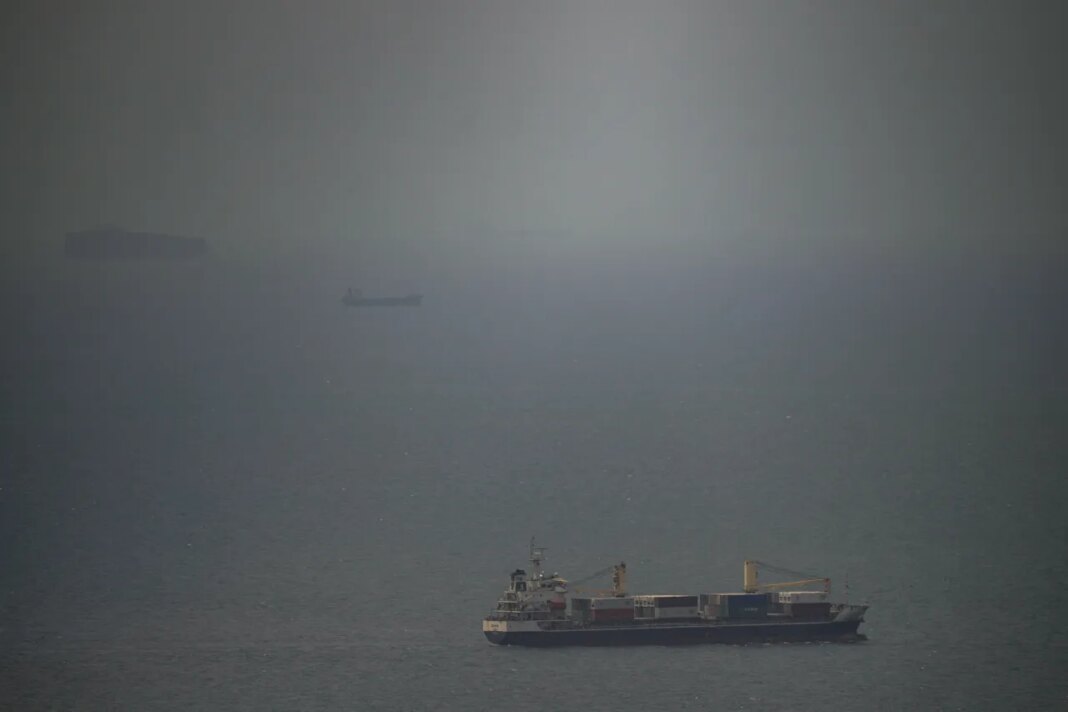 A cargo ship sails in the Persian Gulf toward the Strait of Hormuz, Wednesday, April 22, 2026. (AP Photo)