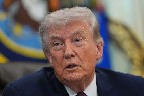 President Donald Trump answers questions from reporters after signing an executive order in the Oval Office of the White House Tuesday, March 31, 2026, in Washington. (AP Photo/Alex Brandon)
