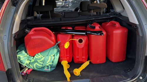 Jerry cans with fuel, sledgehammers, a shotgun and duct tape were all found in the back of a Mercedes SUV.