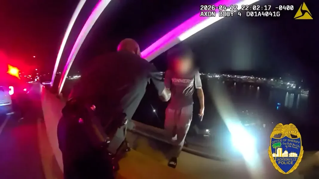 ‘You can get through it’: Florida officer offers hand, prayer to save man on top of bridge