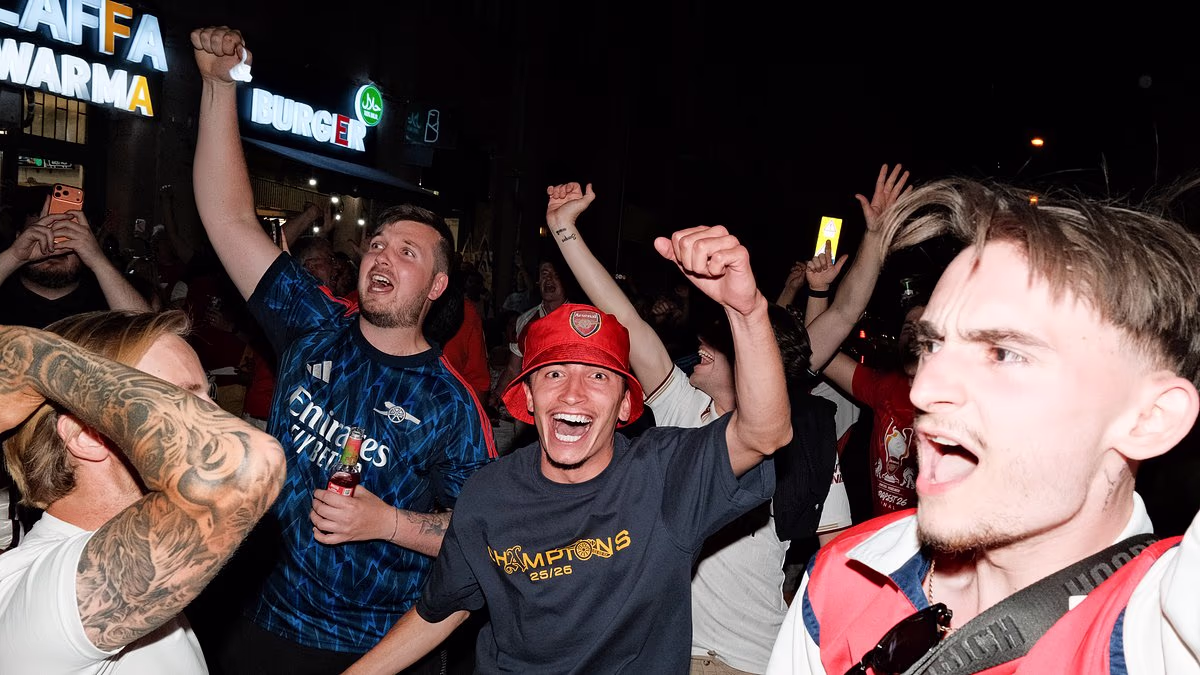 Arsenal fans clash with Paris St Germain gangs in Budapest and police arrest two British supporters ahead of Champions League Final