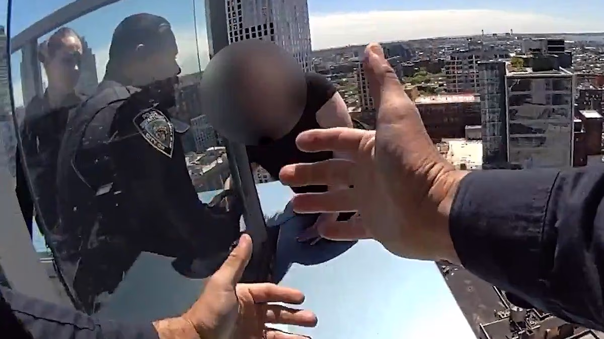 Brave cops rescue woman as she dangles from edge of NYC skyscraper