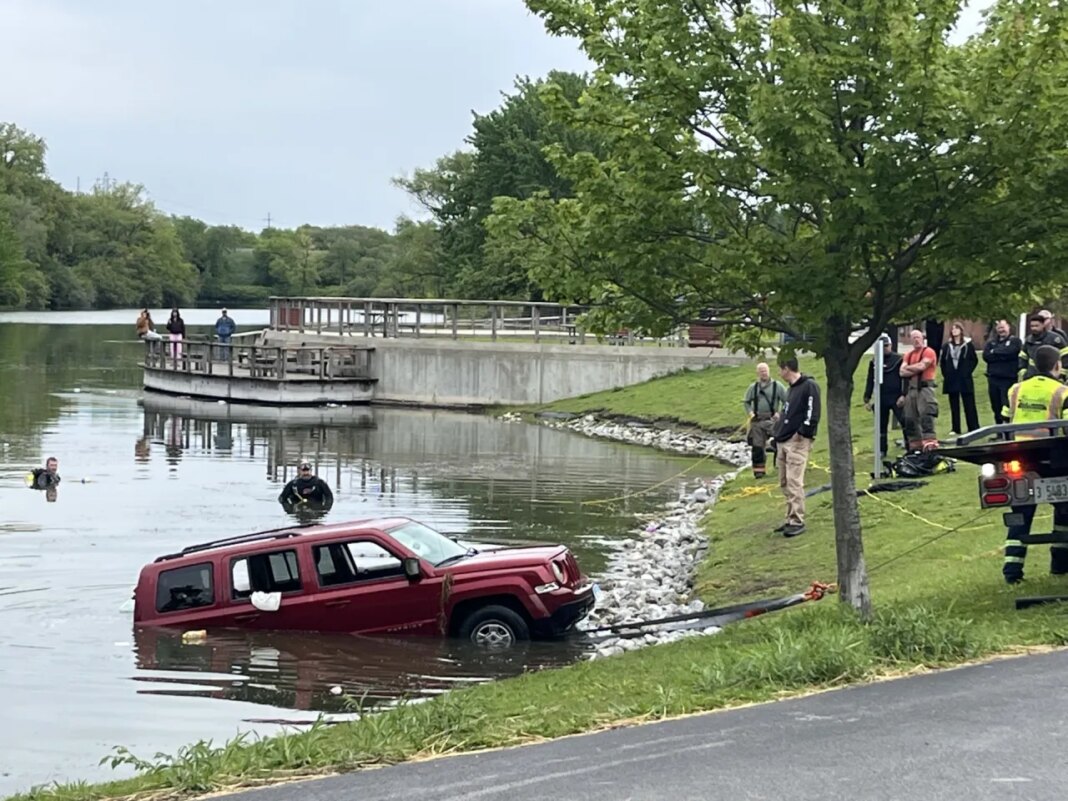Champaign emergency crews respond to car in Kaufman Lake