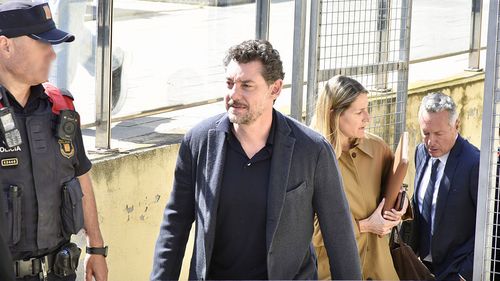 Dead fashion magnate's son breaks silence on murder suspicions
