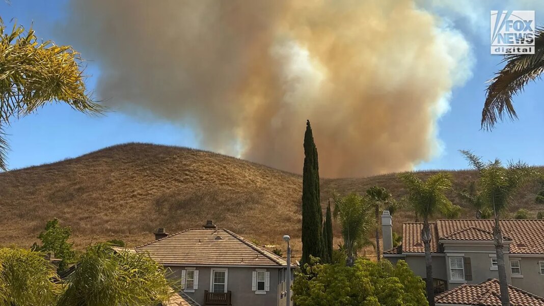 Fast-moving Sandy Fire burns hundreds of acres in Southern California, forcing evacuations in Simi Valley area