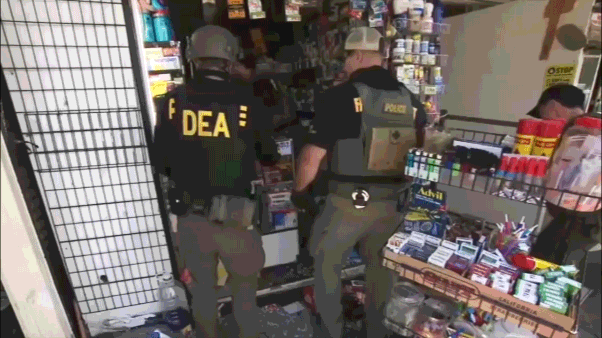 Feds seize mountain of fentanyl from 'open-air drug market' in massive crackdown targeting gang crews