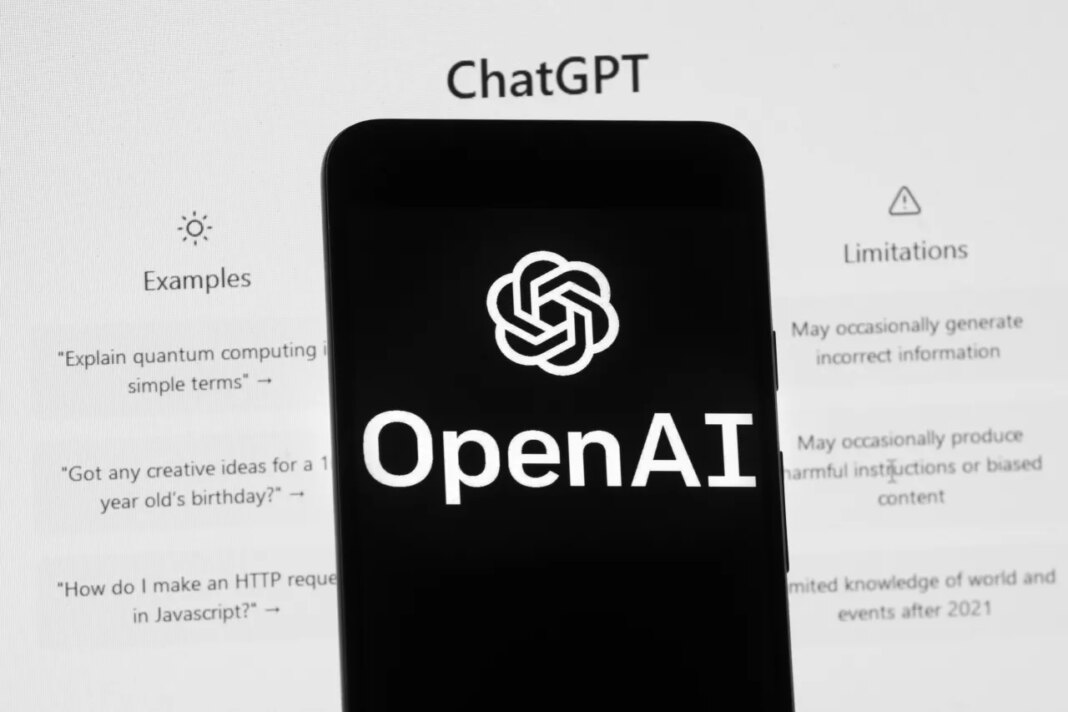FILE - The OpenAI logo is seen on a mobile phone in front of a computer screen which displays the ChatGPT home Screen, March 17, 2023, in Boston. (AP Photo/Michael Dwyer, File)