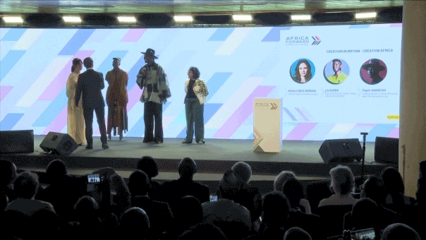 Macron takes the stage uninvited at Africa summit to scold crowd for 'total lack of respect'