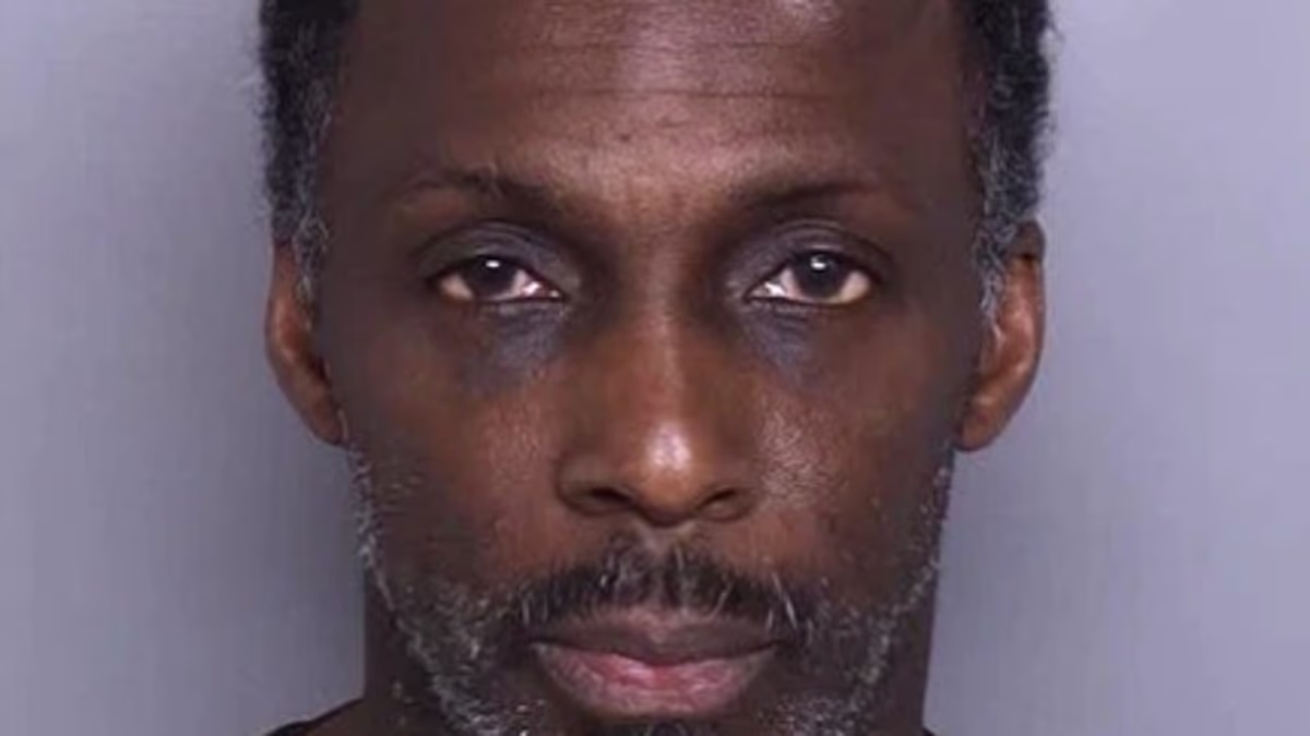 Man arrested after alleged Peeping Tom photographed students