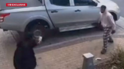 Two men have allegedly attacked each other with metal poles during a wild street brawl in Melbourne's west.