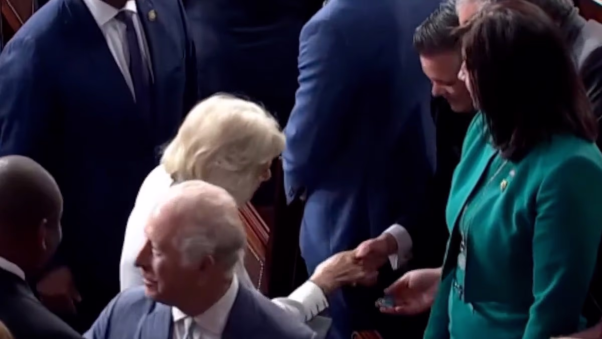 Moment Queen Camilla is handed mystery token by Republican politician