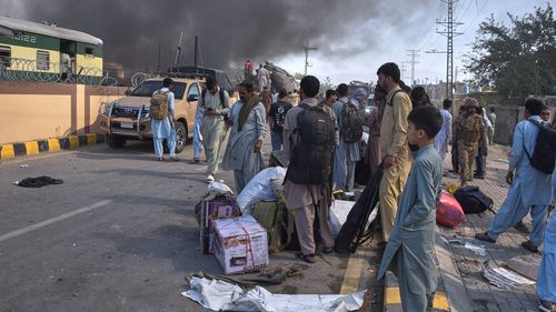 More than a dozen killed as bomb explodes near train