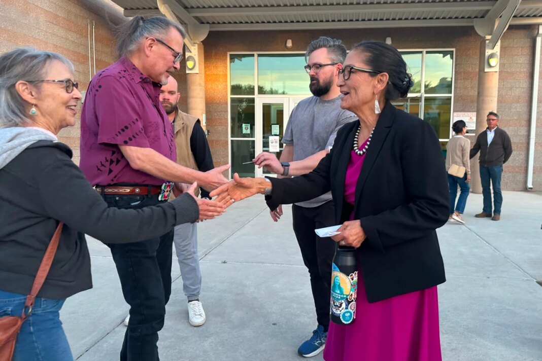 Former U.S. Interior Secretary Deb Haaland, a Democratic candidate for governor of New Mexico, greets people outside a candidate forum in Rio Rancho, N.M., on April 28, 2026, ahead of a June 2 primary election. (AP Photo/Morgan Lee)