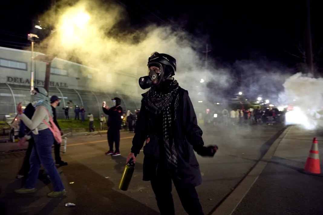 Anti-ICE protesters take to the streets during clashes with law enforcement outside the Delaney Hall detention center on Saturday, May 30, 2026, in Newark, N.J. (AP Photo/Angelina Katsanis)