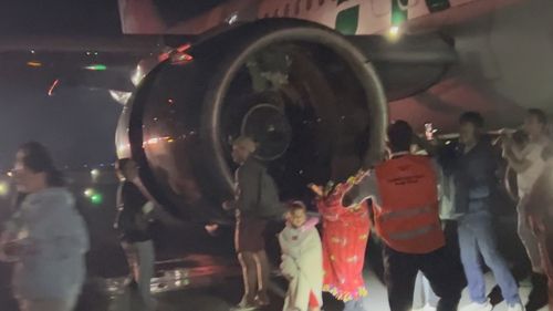 The engine that caught fire after striking a person on the runway.
