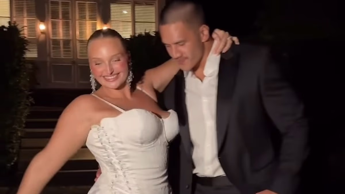 Plus-size model who was criticised for her wedding dress reveals her VERY raunchy reception ensemble