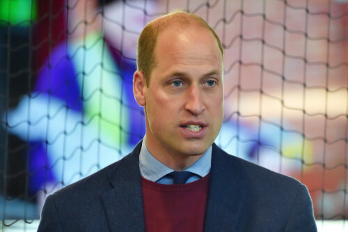Prince William celebrates with Aston Villa players after major victory