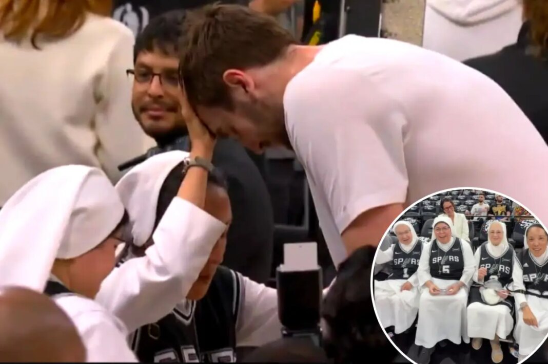 Salesian Sisters bless Spurs' Luke Kornet ahead of Game 4 win