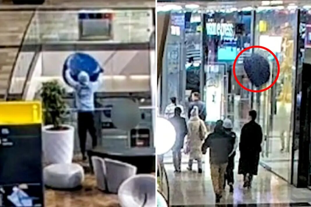 Shocking moment teen throws 30-pound couch from top floor shopping mall