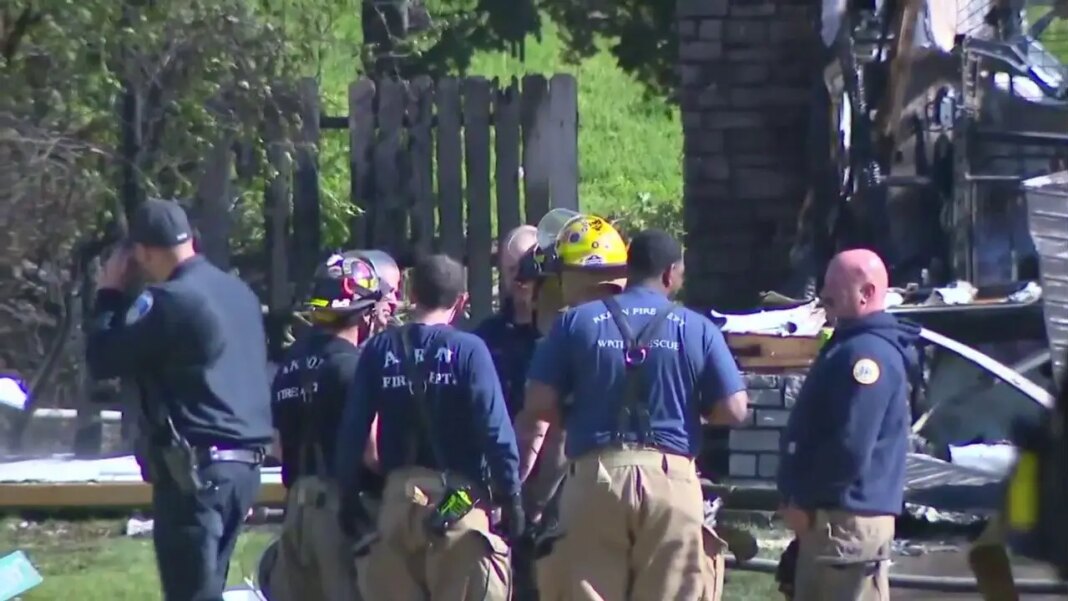 Small plane crashes into Ohio home killing 2 on board, igniting blaze in residential area