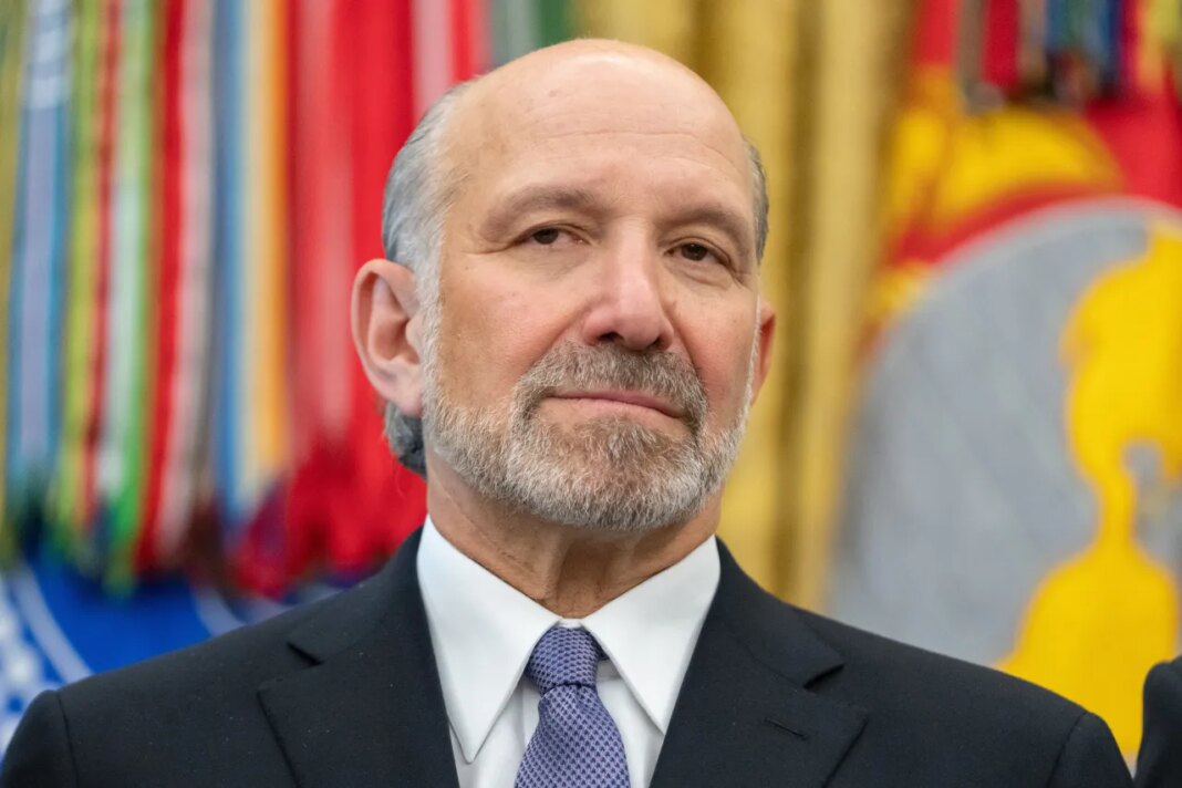 FILE - Commerce Secretary Howard Lutnick attends an event on health care affordability in the Oval Office at the White House, April 23, 2026, in Washington. (AP Photo/Mark Schiefelbein, File)