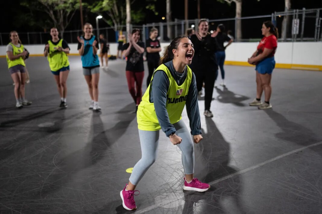 Grace Curatolo celebrates after making a shot during a handball practice session in Tustin, Calif., Wednesday, March 25, 2026. (AP Photo/Jae C. Hong)