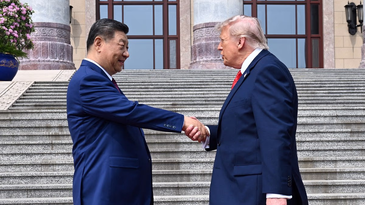 Trump's hidden five-tap code in handshake with Xi