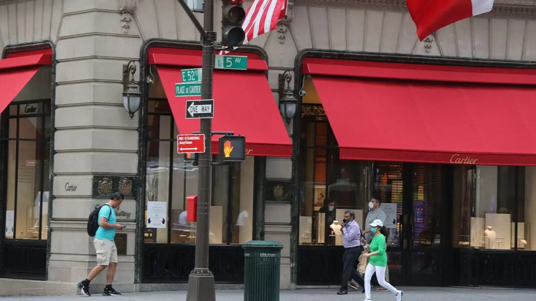 Woman dies after plunging into uncovered manhole outside luxury stores