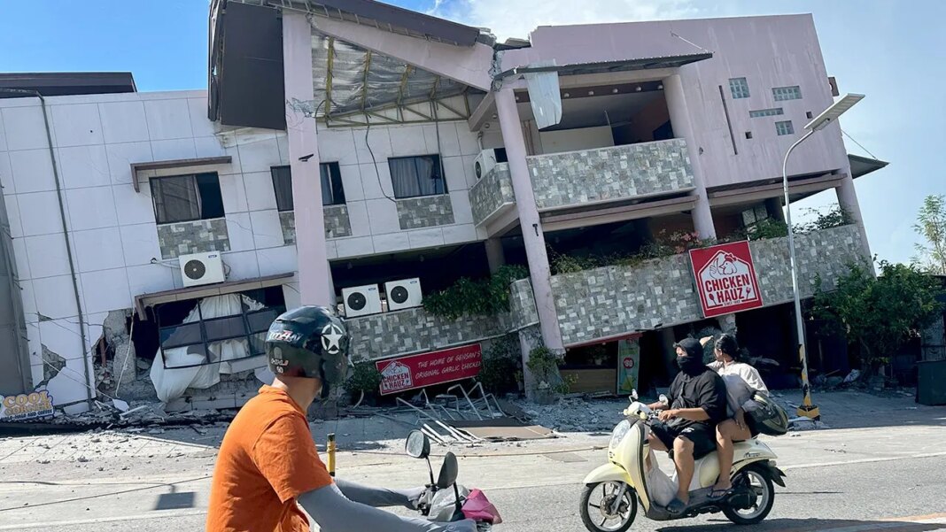A 7.8 magnitude quake in the Philippines kills at least 32, collapses buildings and sparks tsunami