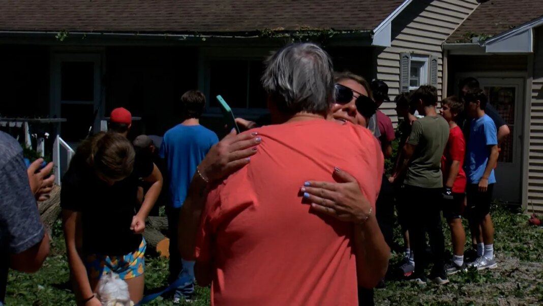 Charleston athletes assist with storm damage cleanup