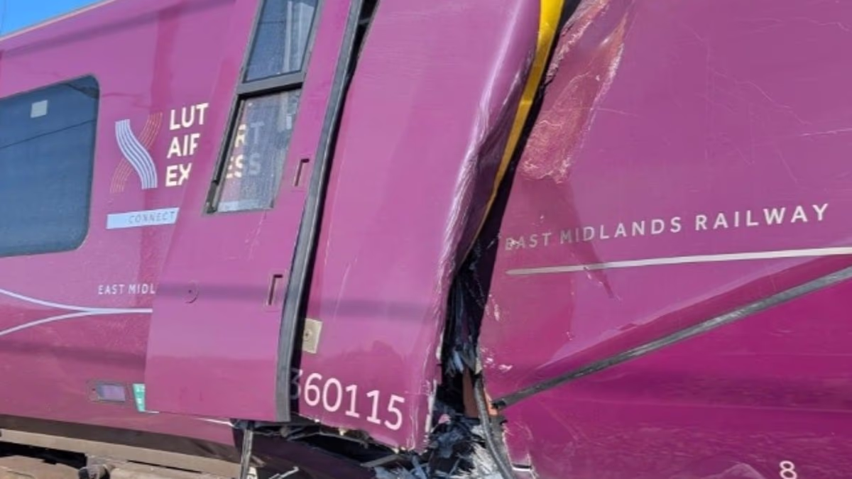 Driver dead and dozens injured as trains collide near Bedford: Major incident declared after Luton Airport Express 'runs into back of stationary train' and passengers are evacuated onto the railway