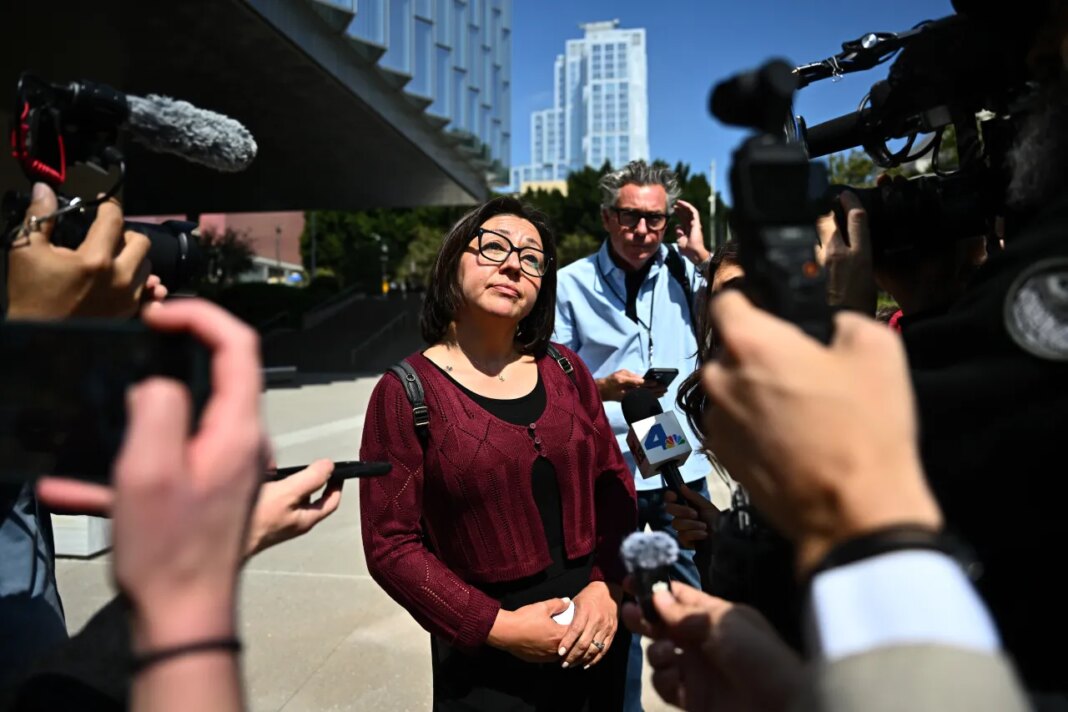Syrena, a member of the jury speaks outside federal court after a federal judge declared a mistrial in the arson case against the man accused of sparking the deadly 2025 Palisades Fire, Friday June 26, 2026, in Los Angeles. (AP Photo/William Liang)