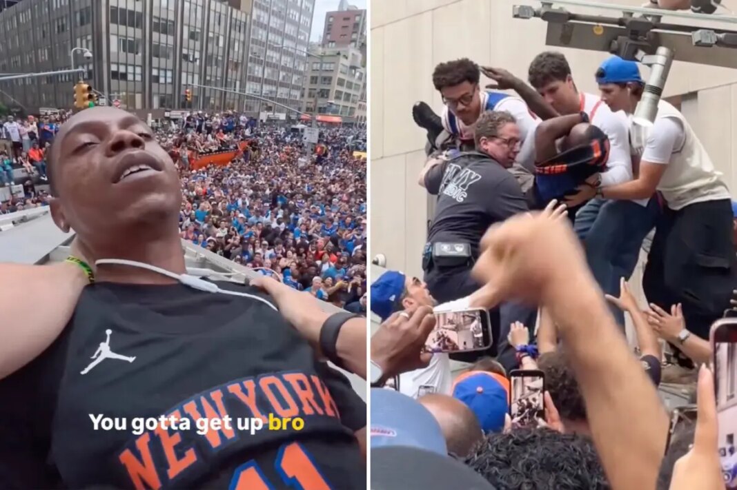 Moment Knicks fans climb structure to save reveler from apparent overdose during championship parade
