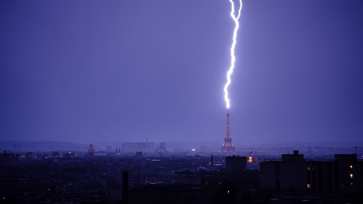 Moment lightning strikes Eiffel Tower as thunderstorms hit France