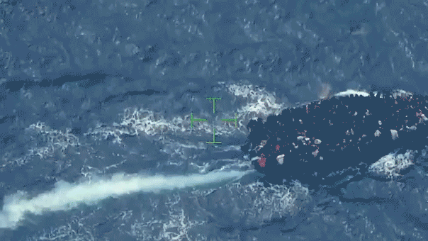 An overloaded migrant vessel carrying 240 people